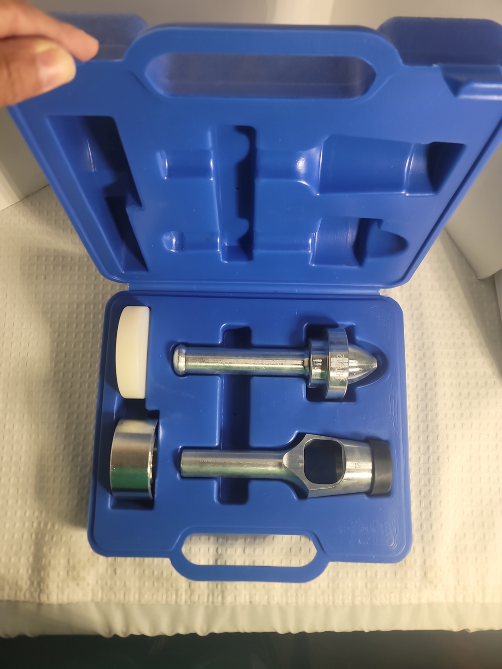 Blue plastic case with embossed text